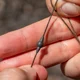 AVID - Zarážky Outline Tungsten Leader Heli Beads