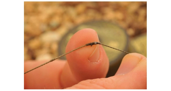 KORDA - Potahovaná šňůrka Kamo Coated Hooklink 20 lb 20 m