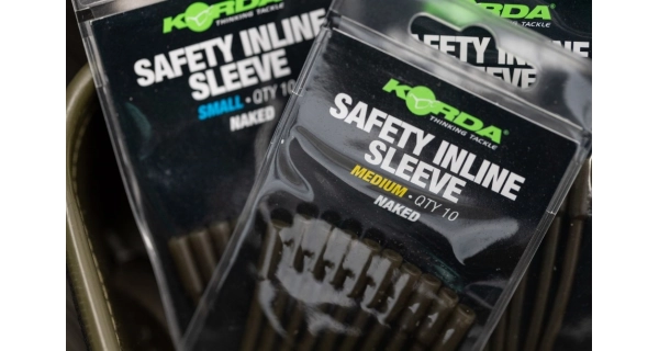 KORDA - Převleky Safety Inline Sleeve Naked Medium 10 ks
